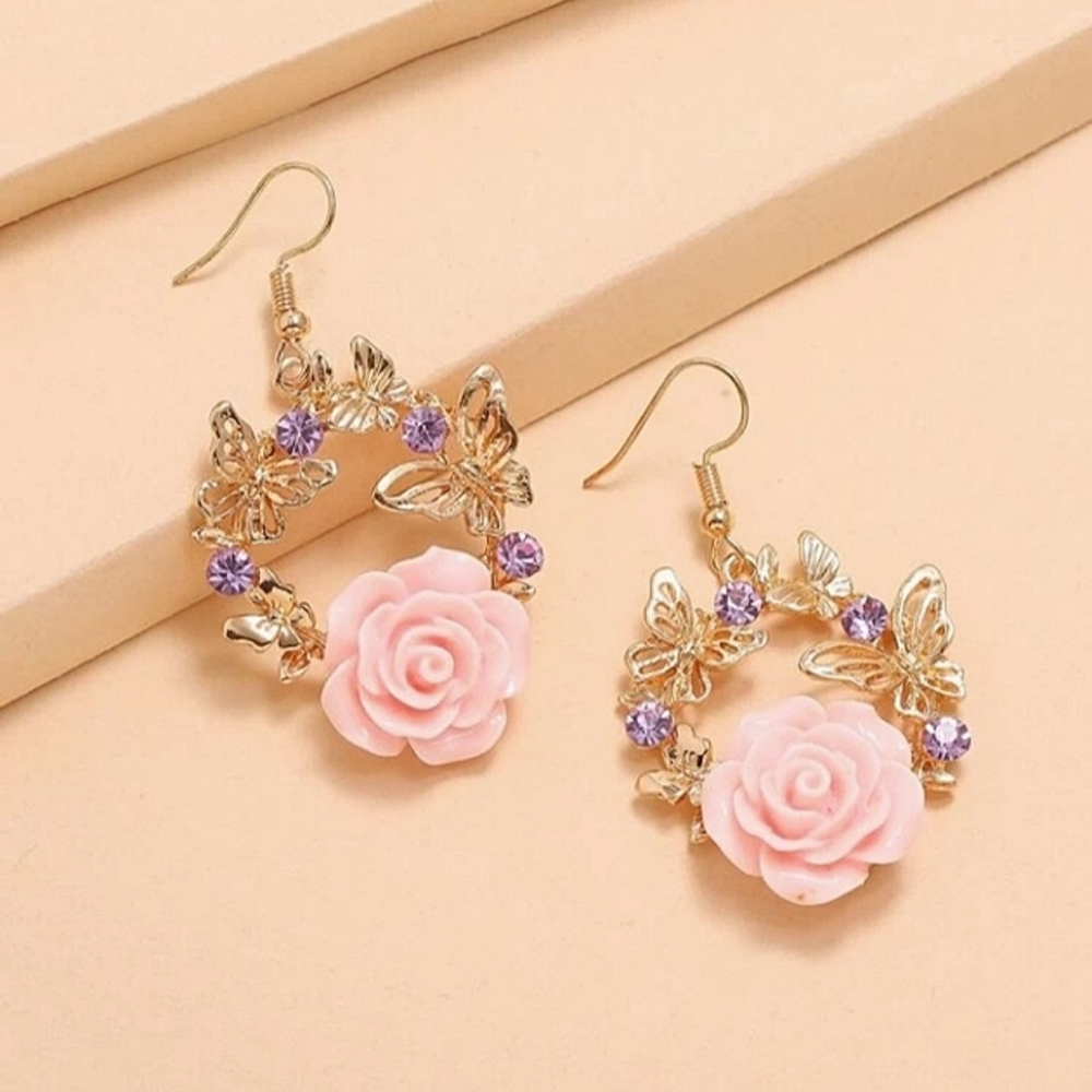 NWT flower and butterfly earrings.